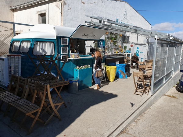 Outdoor lunch place in Grañón. Wonderful sunshine. We do not think the Peugeot was able to move.