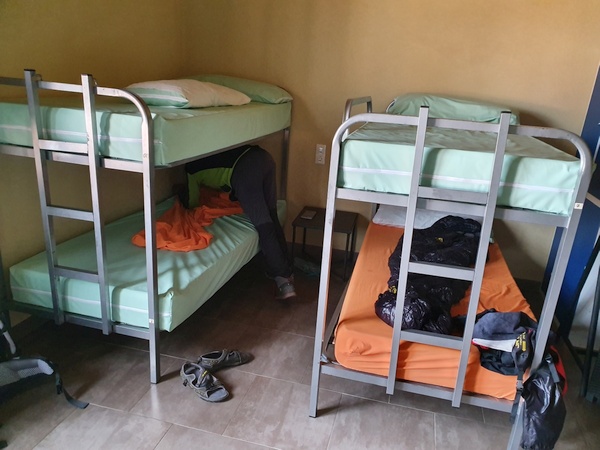 Bunk beds in the albergue part of a hotel in Castrojeriz called A CIEN LEGUAS.