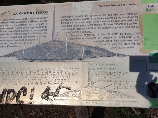 Description of Cruz de Ferro. Every pilgrim brings a stone from home to leave here. Over time the pile has grown 7 meter tall.