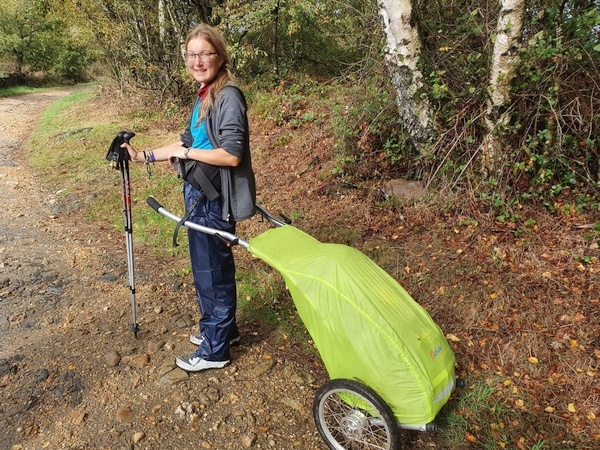 German girl showing an alternative way to carry your belongings