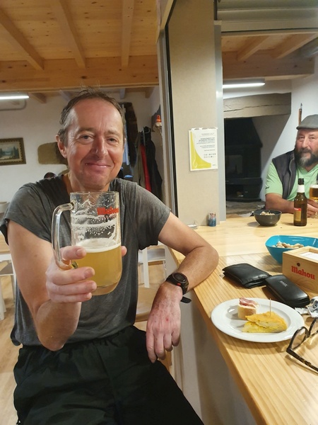 At Albergue A Ponte de Ferreiros in Outeiro. All soaked up from rain. But the beer was worth it.