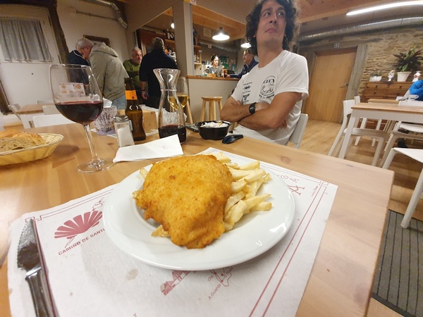 At Albergue A Ponte de Ferreiros in Outeiro. Main dish - chicken with frites.