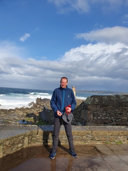Claus in front of Faro de Muxia.