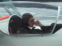 A WW1 pilot in a glider on a frozen lake